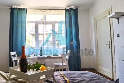 Apartament cu 2 camere semidecomandat, mobilat în Central