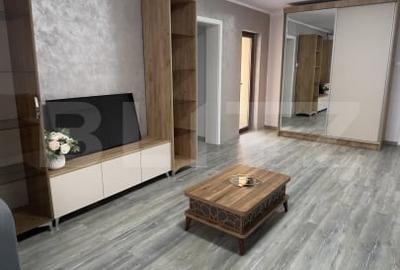 Apartament cu 3 camere semidecomandat, mobilat în Central