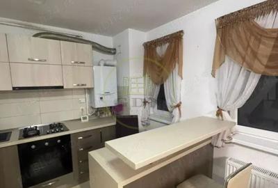 Apartament cu 2 camere decomandat în Tractorul