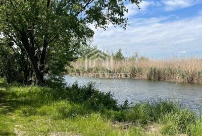 Teren 1000 MP  cu deschidere 24 m la lac -Snagov Gruiu-  pozitie excelenta - 1