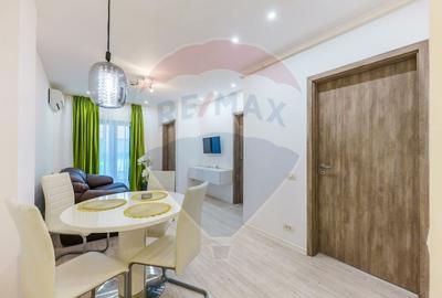 Apartament cu 2 camere semidecomandat, mobilat în Central