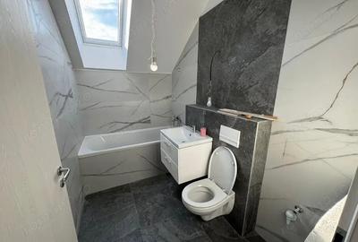 Decomandat . Cu 2 bai. Loc de parcare inclus Decomandat . Cu 2 bai. Loc de parcare inclus - 4