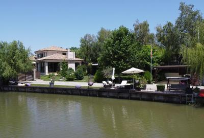 Imobil  de lux pe malul lacului cu ponton, complet mobilat si utilat - 1