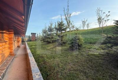 Cabana din lemn rotund, 2 camere, 140 mp, teren 2800 mp, Pal - 12