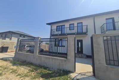 Vila cu 4 camere,2 bai,finisaje deosebite,curte 330 mp