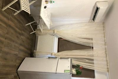 Garsonieră decomandată în Titan