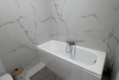 Apartament cu 3 camere semidecomandat în Tunari