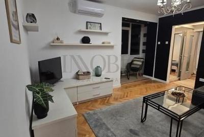 Apartament cu 2 camere semidecomandat, mobilat în P-ța Romană - 1