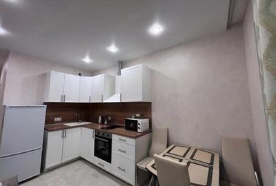 Garsonieră decomandată în Titan