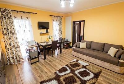 Apartament cu 2 camere semidecomandat, mobilat în Central
