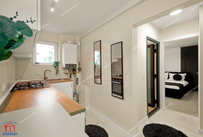 Apartament cu 3 camere semidecomandat, mobilat în Central