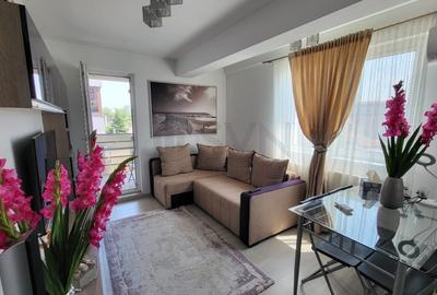 Apartament cu 3 camere semidecomandat, mobilat în Ozana