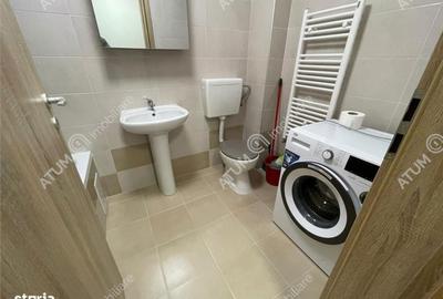 Apartament cu 3 camere decomandat în Cristian - 2