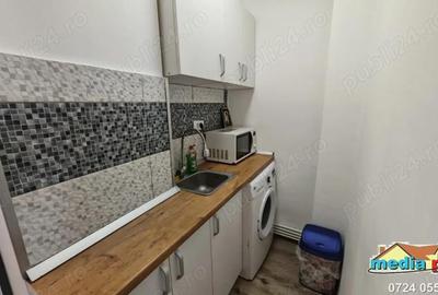 Garsonieră decomandată în Central - 7