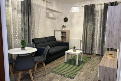 Apartament cu 2 camere semidecomandat, mobilat în Central