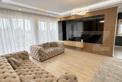 Casa INDIVIDUALA , 2 locuri de parcare , gradina amenajata , LUX