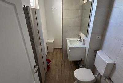 Garsonieră decomandată în Central - 7