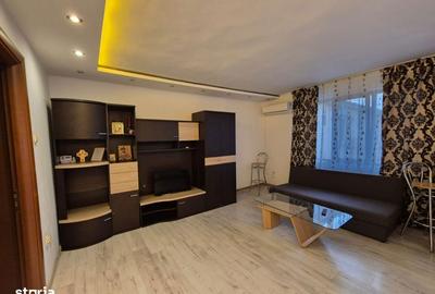 Apartament cu 2 camere semidecomandat, mobilat în Central