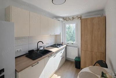 Apartament cu 2 camere decomandat în Tractorul