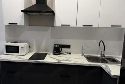 Garsonieră decomandată în Titan