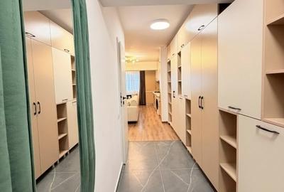 Apartament cu 3 camere semidecomandat, mobilat în Central