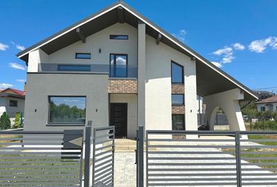 Vila de vanzare cu design deosebit in cartierul Bucium - 1