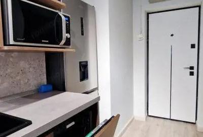 Garsonieră decomandată, mobilată în 1 Mai - 9