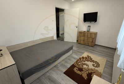 Apartament cu 3 camere semidecomandat, mobilat în Carei - 8