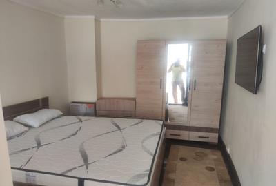 Apartament cu o cameră în casă cu 4 apartamente, cu parcare proprie - 10