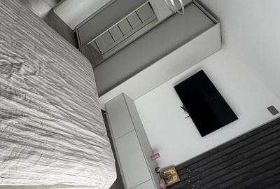 Apartament cu 4 camere decomandat în Căpățânești