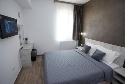 Apartament cu 2 camere semidecomandat, mobilat în Central
