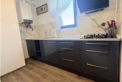 Apartament cu 2 camere semidecomandat, mobilat în Km 5 - 6