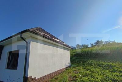 Casa cu 2 camere ?i living cu o gradina generoasa in su