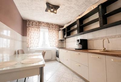 Apartament cu 4 camere decomandat în Confecții - 1