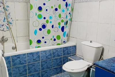 Apartament cu 3 camere semidecomandat în Central - 1