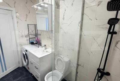 Apartament cu 2 camere semidecomandat în Chinteni - 2