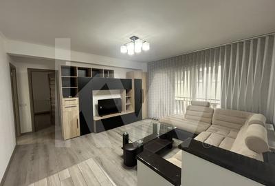 2 dormitoare, living generos si bucatarie inchisa - apartament de inchiriat 2 dormitoare, living generos si bucatarie inchisa - apartament de inchiriat - 3