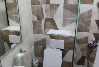 Garsonieră decomandată în Titan