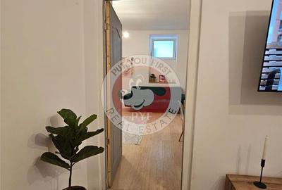 Apartament cu 4 camere decomandat în Romană