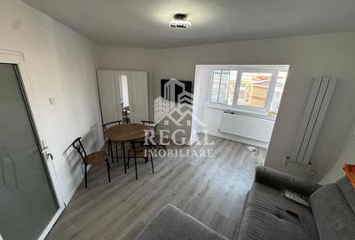 Garsonieră decomandată în Central - 9