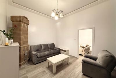 Apartament cu 2 camere semidecomandat, mobilat în Central