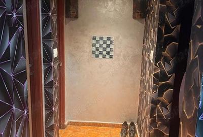 Casă cu Teren 1000 Mp în Putineiu