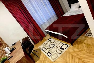 Apartament cu 3 camere semidecomandat, mobilat în Central