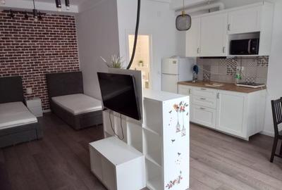 Închiriere Apartament Studio Modern – Zonă Centrală - curte interioara 450 Eur