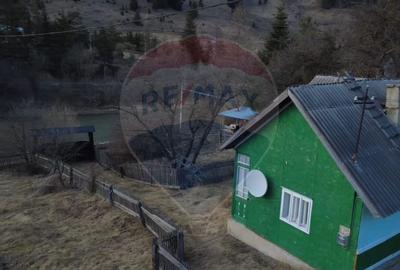 Casă cu 2 camere cu Teren 9287 Mp în Dorna-Arini - 9