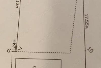 Teren de 911 mp, în