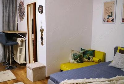 Garsoniera vis-a-vis de metrou Titan, mobilata complet, etaj 4/10 - 2