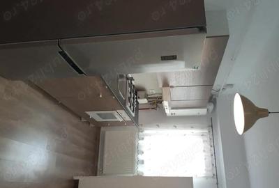Garsonieră decomandată în Central - 9