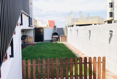 Apartament 102 mp +  curte proprietate  1001mp si foisor 24 mp inchis comple