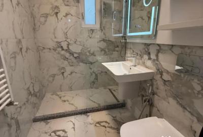 Garsonieră decomandată în Central - 7